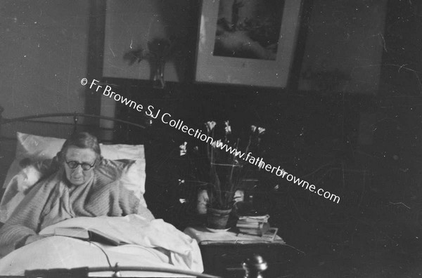 FRANK BROWNE'S SISTER IN BED READING